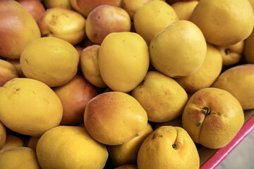 Yellow apples in a market