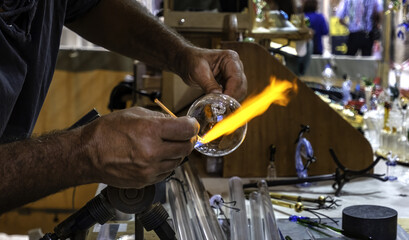 Blowing glass in a traditional way