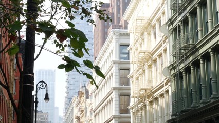 Fototapeta premium New York City Manhattan Soho fashion district near Broadway street. USA urban building facade, old american architecture. Shopping in NYC, United States. Business and residential real estate. Lantern