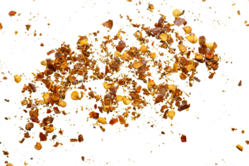 dried red chili pepper flakes and seeds isolated on white background