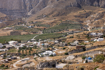 Fototapeta premium Aerial view of farmland and vineyards in the Kamari area on Santorini, Greece