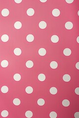Pattern of large white polka dots on a pink background