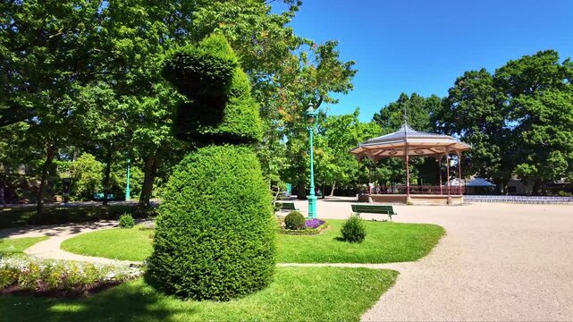Part view at summer in the beautiful and public Thabor Park located in Rennes, France.