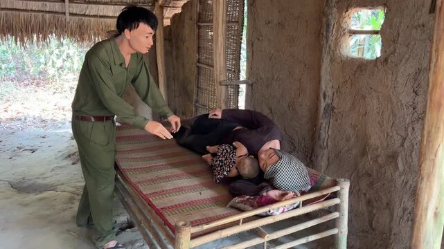 Viet Nam Cu Chi tunnels mannequins display life of the past Viet Cong's base of operations for Tet Offensive in 1968. Famous tourist attraction in Vietnam