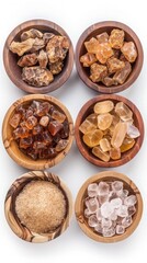 Fototapeta premium Variety of Natural Resins and Sugars Displayed in Wooden Bowls