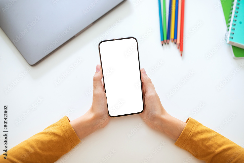 Poster a person is holding a smartphone with a blank screen in their hands. the phone is positioned horizon
