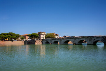 Obraz premium Historic Tiberius Bridge, ancient Roman architecture, Rimini landmark, built 21 AD.