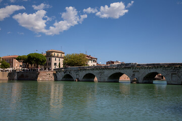 Naklejka premium Historic Tiberius Bridge, ancient Roman architecture, Rimini landmark, built 21 AD.