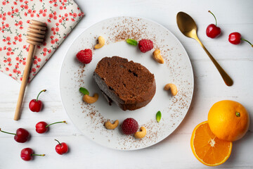 Delicious piece of chocolate cake seen from an overhead perspective.