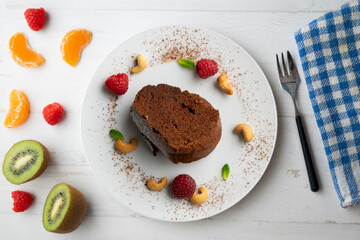 Delicious piece of chocolate cake seen from an overhead perspective.