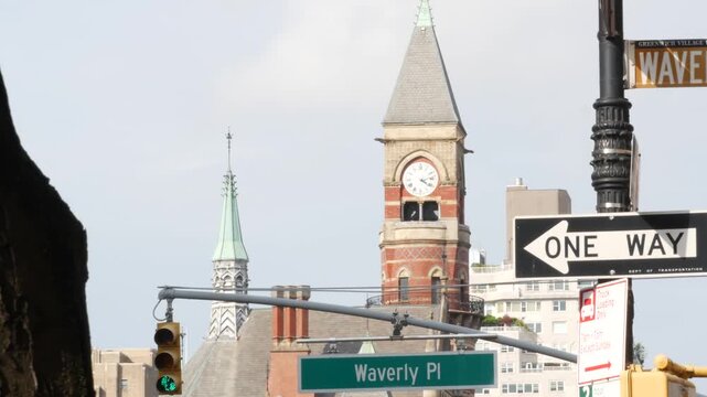 New York City street. Manhattan Greenwich village landmark, United States. Jefferson Market Library building architecture, Courthouse clock tower on 6 sixth Americas avenue, USA. One way road sign.