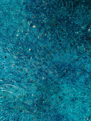 Abstract wave glass pattern background. Texture of wavy glass illuminated with colored light. Blurry bright backdrop for banner, Soft focus