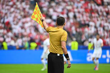 Assistant of football referee during the match