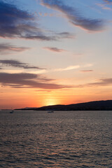 Naklejka premium orange sunset over the sea