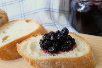 Baguette with blueberry jam on top