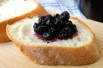 Baguette with blueberry jam on top