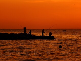 Fototapeta premium fishing at sunset