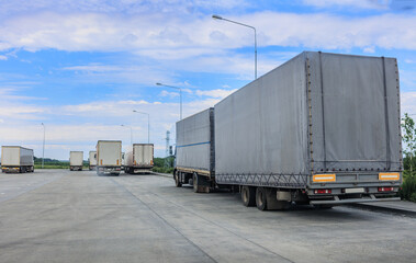 trucks in a parking lot outside the city