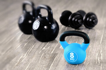 Kettlebells and dumbbells are sports fitness equipment. Fitness training lifestyle and healthy...