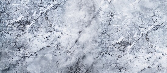 Fototapeta premium Top down view of a textured marble surface suitable for highlighting graphic products or interior design with a blank area for inserting an image. Copy space image. Place for adding text and design