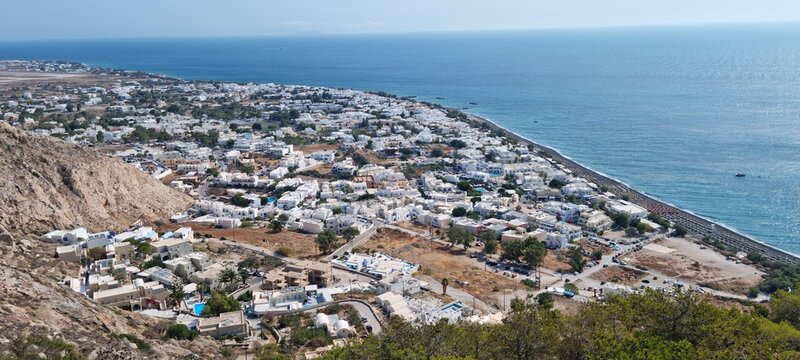 view of Kamari city in Santorini from the ancient thera road
