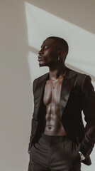 Fototapeta premium Modern Black Suit Worn by a Young Black Man