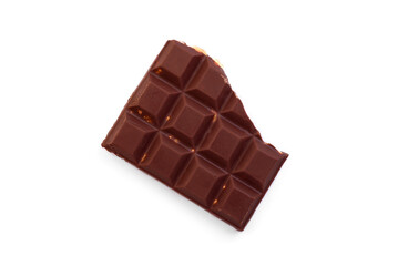 Milk chocolate with whole hazelnuts isolated on white background.