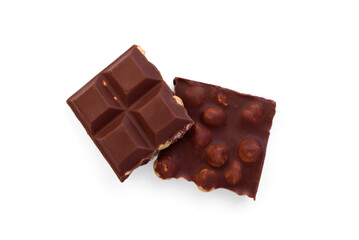 Milk chocolate with whole hazelnuts isolated on white background.
