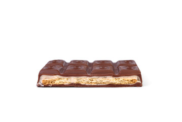 Milk chocolate with strawberry and cookies isolated on white background.