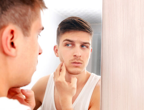 Young Man near a Mirror