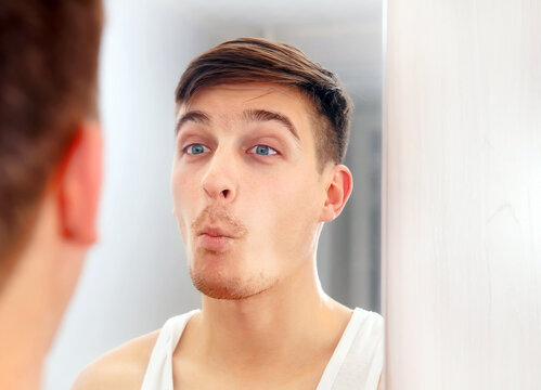 Young Man near a Mirror