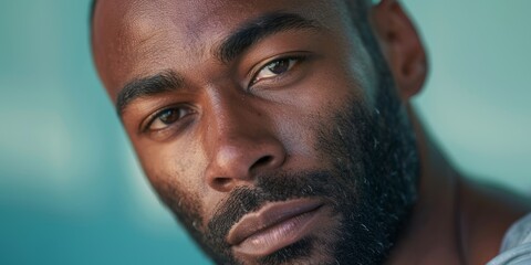 Fototapeta premium An eye, half face, and black male mockup for business, internet marketing, or work. Banner and photograph of an African individual with agency or corporate company details and a smile.