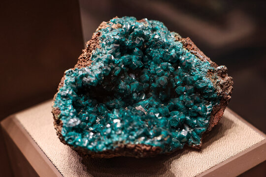 Dioptase is an intense emerald-green to bluish-green copper cyclosilicate mineral. It is transparent to translucent.