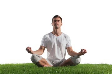Fototapeta premium man doing yoga meditation on green grass lawn Isolated on white background