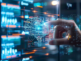 A hand is pointing at a brain on a computer screen