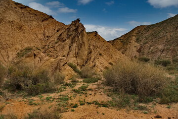 Northern Kyrgyzstan. The unusual texture of red-yellow clay rocks in the famous Skazka Canyon, off...