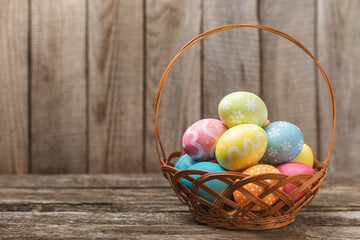 Easter eggs on a bright background. Easter celebration concept. Colorful easter handmade decorated Easter eggs. Place for text. Copy space.