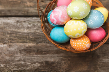 Easter eggs on a bright background. Easter celebration concept. Colorful easter handmade decorated Easter eggs. Place for text. Copy space.