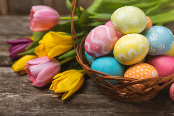 Easter eggs on a bright background. Easter celebration concept. Colorful easter handmade decorated Easter eggs. Place for text. Copy space.