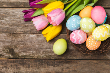 Easter eggs on a bright background. Easter celebration concept. Colorful easter handmade decorated Easter eggs. Place for text. Copy space.