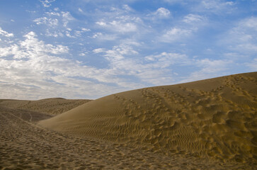 Sam Sand dunes in Thar Desert, grainy sand, Texture, Pattern, Background, Jaisalmer, Rajasthan, India, Asia.