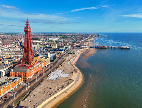 Aerial Image of Blackpool Tower along the Fylde Coast, Lancashire during a lovely Summer evening on the Sea front. 28th July 2024.