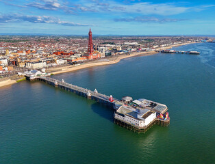 Aerial Image of Blackpool Tower along the Fylde Coast, Lancashire during a lovely Summer evening on the Sea front. 28th July 2024.