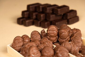 Christmas chocolates on the beige background