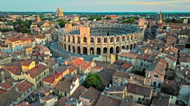 Panorama of ancient town Arles in Provence and Cote d'Azur, France, South Europe. Aerial view of Ancient, 2-tiered Roman gladiatorial amphitheatre hosting bullfighting and community events.