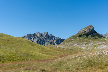 Majestic summer day in the Durmitor National park. Village Zabljak, Montenegro, Balkans, Europe. Scenic image of popular travel destination. Discover the beauty of earth. Hiking nature destination