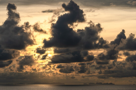 golden sunrise with cloudy sky in the morning. Harmony and beauty in nature. Scenic peaceful sea view
