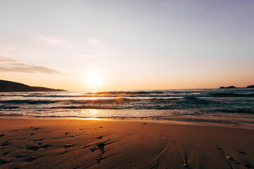 a sunset on the sea beach