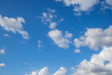 blue sky and beautiful fluffy white clouds