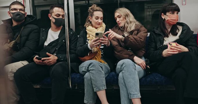 People, smartphone and conversation on commute, train journey and bonding on holiday or vacation. Friends, women and talking on metro, public transportation and adventure or traveling together